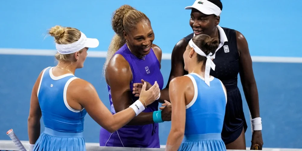 Марта Костюк під час парного матчу проти сестер Вільямс на WTA 1000 у Цинциннаті